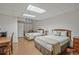 Spacious bedroom featuring two beds, a desk, and a calming atmosphere, perfect for relaxation and productivity at 57 Forsyth Nw St # 14B, Atlanta, GA 30303