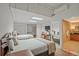 Bright bedroom featuring two cozy beds, a desk, and an ensuite bathroom for ultimate comfort and convenience at 57 Forsyth Nw St # 14B, Atlanta, GA 30303