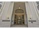 Exterior entrance of the Healey Building showing the revolving doors and gold accents at 57 Forsyth Nw St # 14B, Atlanta, GA 30303