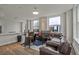Bright living room featuring an open layout, dining area, and a comfortable leather sofa at 57 Forsyth Nw St # 14B, Atlanta, GA 30303