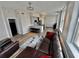 Spacious living room with wood flooring, a modern kitchen, and large windows at 57 Forsyth Nw St # 14B, Atlanta, GA 30303