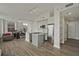 Open floorplan living space with a kitchen, dining area, and a seating area, and light hardwood floors at 57 Forsyth Nw St # 14B, Atlanta, GA 30303
