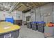A room with trash and recycling bins for convenient waste disposal at 57 Forsyth Nw St # 14B, Atlanta, GA 30303