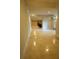 Finished basement with tile flooring and open layout, leading to an outside entrance at 1010 Forest Overlook Sw Dr, Atlanta, GA 30331