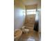 Cozy bathroom with tiled shower over tub, a window, and a sink at 1010 Forest Overlook Sw Dr, Atlanta, GA 30331