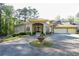 Stunning home features a circular driveway and beautifully landscaped front yard with an elegant fountain at 1010 Forest Overlook Sw Dr, Atlanta, GA 30331