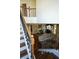 View from the stairs to the living room and dining area at 1010 Forest Overlook Sw Dr, Atlanta, GA 30331
