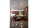 Gourmet kitchen boasts granite counters, stainless steel appliances, and ample cabinet space at 1010 Forest Overlook Sw Dr, Atlanta, GA 30331
