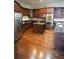 Spacious kitchen featuring dark wood cabinetry, granite countertops, and stainless appliances at 1010 Forest Overlook Sw Dr, Atlanta, GA 30331