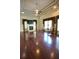 Spacious living room boasts hardwood floors, a fireplace, and elegant window treatments at 1010 Forest Overlook Sw Dr, Atlanta, GA 30331