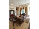 Elegant living room featuring fine furnishings, a large window and sophisticated décor at 1010 Forest Overlook Sw Dr, Atlanta, GA 30331