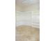Walk-in pantry featuring tiled floors and open white shelving at 1010 Forest Overlook Sw Dr, Atlanta, GA 30331