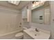 Clean and functional bathroom with tub/shower combo, white fixtures, and ample vanity space at 248 Riverview Trl, Roswell, GA 30075