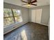 Bedroom with plush carpet, natural light, and ample closet space, perfect for organizing your wardrobe at 2572 Laurel Cir, Atlanta, GA 30311