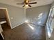 Bedroom with plush carpet, light-filled window, and closet door offers both comfort and functionality at 2572 Laurel Cir, Atlanta, GA 30311