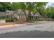 Well maintained clubhouse exterior with parking, covered area and lush landscaping at 2572 Laurel Cir, Atlanta, GA 30311