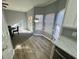 Bright eat-in kitchen area with modern lighting and stainless steel appliances at 2572 Laurel Cir, Atlanta, GA 30311