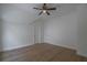 Bedroom with hardwood floors and two doors at 3007 Holly St, Canton, GA 30115