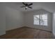 Bright bedroom with hardwood floors and a window at 3007 Holly St, Canton, GA 30115