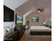 Staged bedroom with many tvs and a plant at 3007 Holly St, Canton, GA 30115