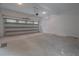 Spacious two-car garage with concrete flooring and an automatic door at 3007 Holly St, Canton, GA 30115