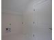 Clean and simple laundry room with white tile flooring at 3007 Holly St, Canton, GA 30115