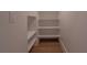 Pantry with built-in shelving and modern lighting at 3007 Holly St, Canton, GA 30115