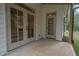 Back patio featuring concrete flooring, and view of the backyard through glass doors at 3007 Holly St, Canton, GA 30115