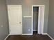 Bedroom with door and closet featuring bifold doors at 20 Pine Canyon Sw Dr # 41, Atlanta, GA 30331
