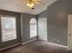 Airy bedroom with nice-sized windows, ceiling fan, and comfortable carpet at 20 Pine Canyon Sw Dr # 41, Atlanta, GA 30331