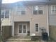 Back exterior elevation featuring double doors and AC unit at 20 Pine Canyon Sw Dr # 41, Atlanta, GA 30331