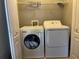 Convenient laundry room with washer, dryer, and storage, perfect for everyday tasks at 20 Pine Canyon Sw Dr # 41, Atlanta, GA 30331