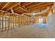 Unfinished basement with exposed wood ceiling beams, wood frames, and a concrete floor at 2021 Cockrell Pointe Nw, Kennesaw, GA 30152