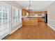 Eat-in kitchen features hardwood floors, lots of cabinetry, and stainless appliances at 2021 Cockrell Pointe Nw, Kennesaw, GA 30152
