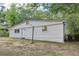Picture of the back of a home with yard at 2765 Ocean Valley Dr, Atlanta, GA 30349