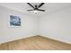 Bright bedroom featuring a ceiling fan, light, and a window at 2765 Ocean Valley Dr, Atlanta, GA 30349