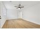 Spacious bedroom with a modern ceiling fan and light, with wood-look flooring at 2765 Ocean Valley Dr, Atlanta, GA 30349