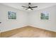 Bright bedroom featuring a ceiling fan, light, and two windows at 2765 Ocean Valley Dr, Atlanta, GA 30349