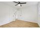 Bright bedroom featuring a ceiling fan, light, and two closets at 2765 Ocean Valley Dr, Atlanta, GA 30349
