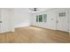 Bright living room featuring modern ceiling fan and light hardwood flooring at 2765 Ocean Valley Dr, Atlanta, GA 30349