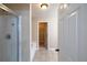 Bathroom featuring a shower, bathtub, and an open doorway to a walk-in closet at 4400 Village Field Pl, Suwanee, GA 30024