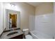 Bathroom featuring a sink and vanity with a bathtub and shower combo at 4400 Village Field Pl, Suwanee, GA 30024