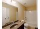 Bathroom featuring a bathtub and shower combo with a sink and vanity at 4400 Village Field Pl, Suwanee, GA 30024