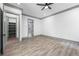 Spacious bedroom features neutral walls, gray trim, ceiling fan, and door to closet and bathroom at 632 Hunters Cove Ln., Loganville, GA 30052