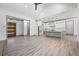 Open-concept living area with a modern kitchen and ample natural light at 632 Hunters Cove Ln., Loganville, GA 30052