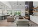 Cozy living room with a fireplace and open layout at 632 Hunters Cove Ln., Loganville, GA 30052