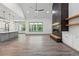 Spacious living room with a fireplace and abundant natural light at 632 Hunters Cove Ln., Loganville, GA 30052