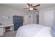 Bedroom with a desk and lots of natural lighting; complete with a ceiling fan for added comfort at 7533 Mason Falls Dr, Winston, GA 30187