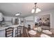 Well-lit kitchen features an island, stainless steel appliances, and adjacent breakfast area at 7533 Mason Falls Dr, Winston, GA 30187