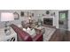 Inviting living room featuring a brick fireplace and stylish decor at 7533 Mason Falls Dr, Winston, GA 30187